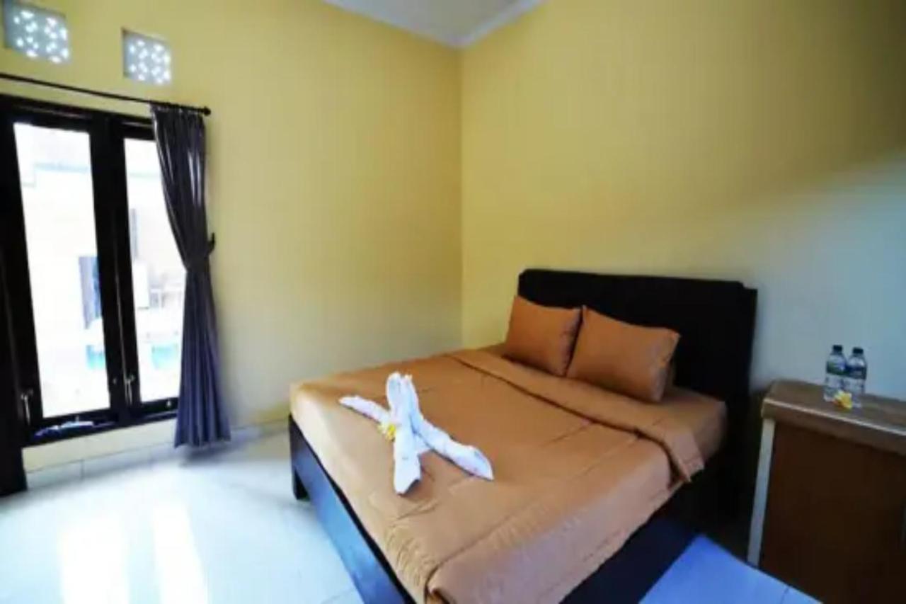 Oyo Flagship 91237 Ratu Guest House Kedunganan Zewnętrze zdjęcie