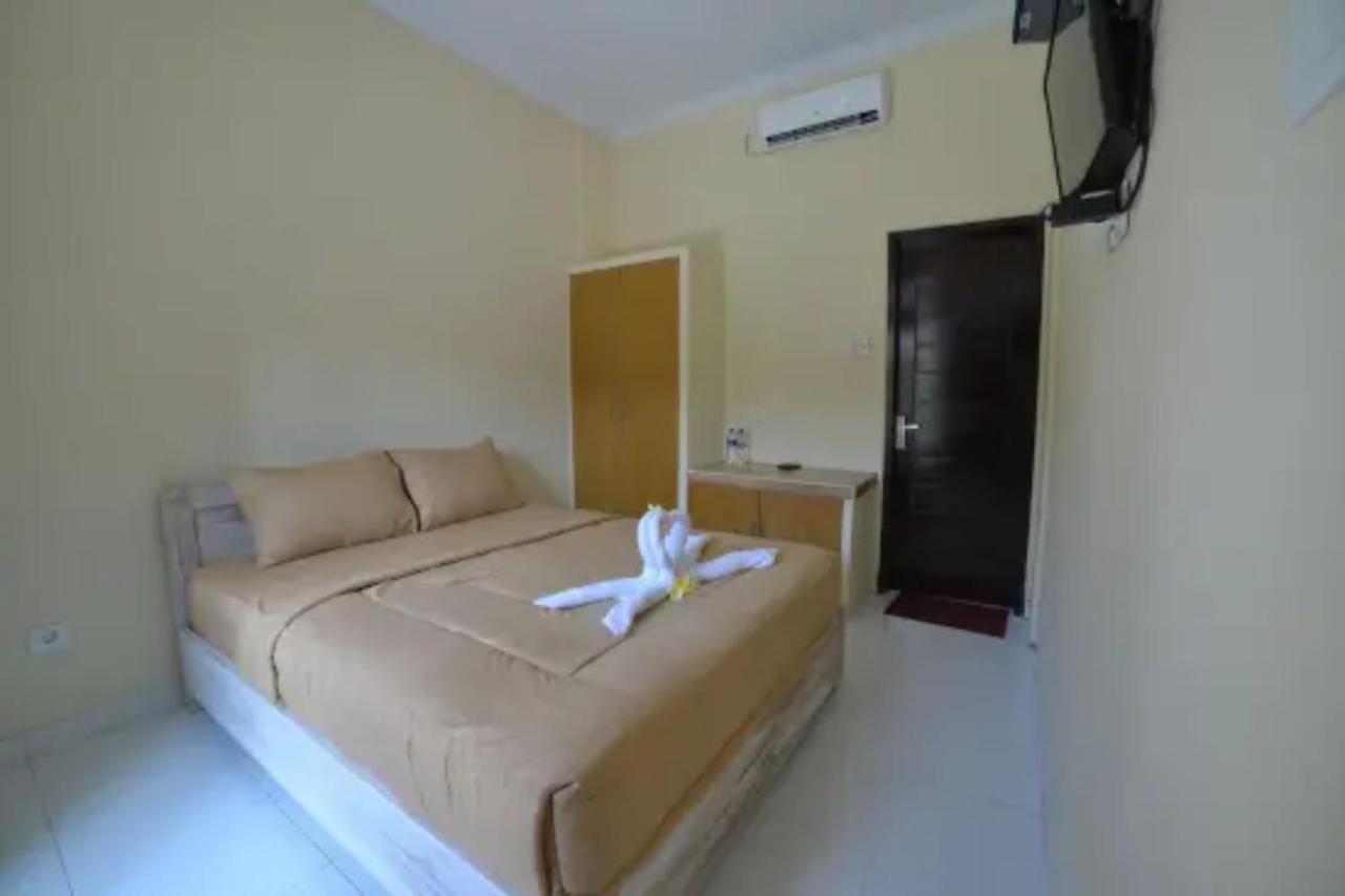 Oyo Flagship 91237 Ratu Guest House Kedunganan Zewnętrze zdjęcie