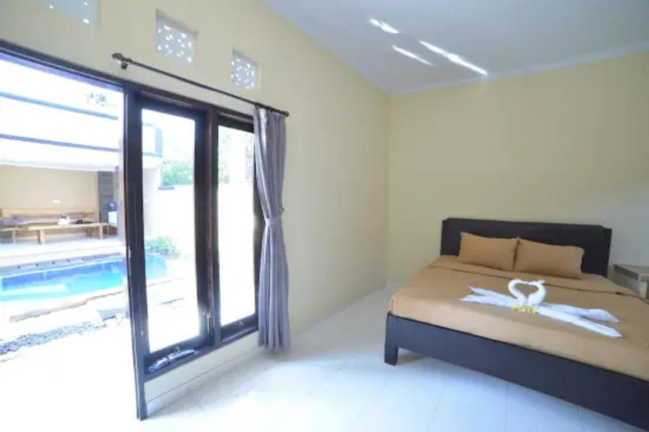 Oyo Flagship 91237 Ratu Guest House Kedunganan Zewnętrze zdjęcie