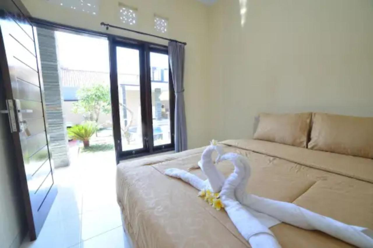 Oyo Flagship 91237 Ratu Guest House Kedunganan Zewnętrze zdjęcie