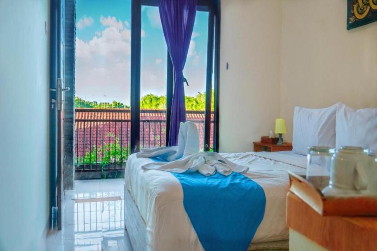 Oyo Flagship 91237 Ratu Guest House Kedunganan Zewnętrze zdjęcie